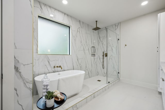 1265 Rd 66112, Dayton, TX 77535 - bathroom featuring a marble finish shower, a soaking tub, recessed lighting, and vanity