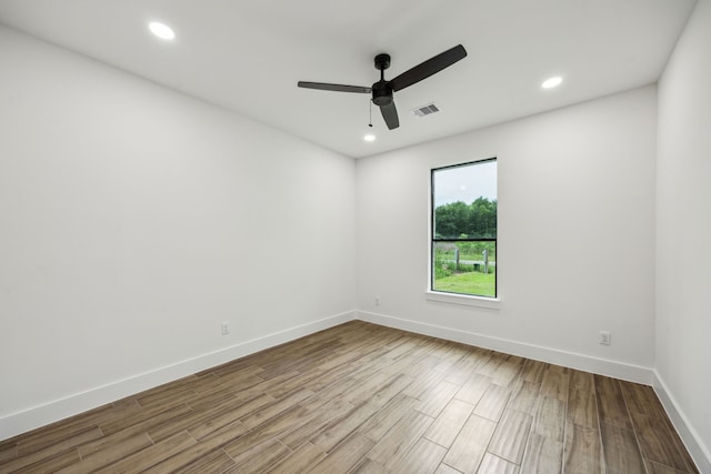 1265 Rd 66112, Dayton, TX 77535 - unfurnished room with ceiling fan, wood finished floors, and recessed lighting