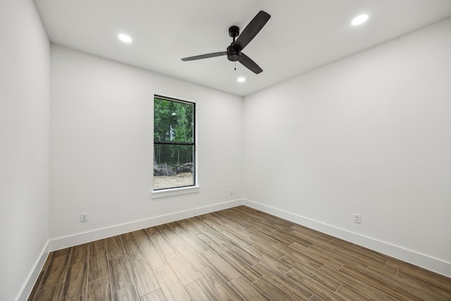 1265 Rd 66112, Dayton, TX 77535 - spare room featuring ceiling fan, wood finished floors, and recessed lighting