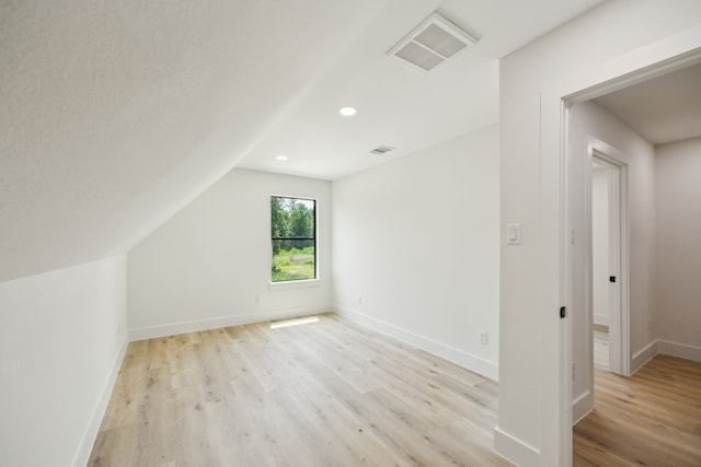 1265 Rd 66112, Dayton, TX 77535 - bonus room featuring light wood-style flooring, recessed lighting, and lofted ceiling