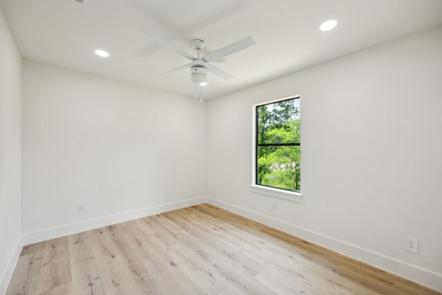 1265 Rd 66112, Dayton, TX 77535 - empty room featuring recessed lighting, wood finished floors, and a ceiling fan