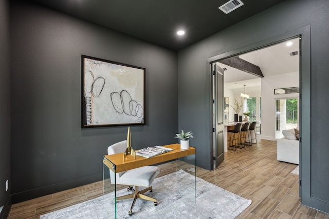 1265 Rd 66112, Dayton, TX 77535 - office area featuring wood finish floors, a chandelier, and recessed lighting