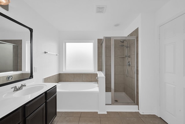19210 Kent Park Dr, Tomball, TX 77375 - full bath with tile patterned floors, a stall shower, vanity, and a garden tub