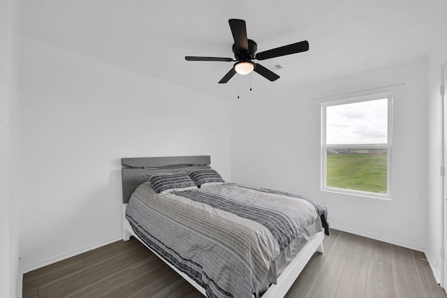 19210 Kent Park Dr, Tomball, TX 77375 - bedroom featuring wood finished floors and ceiling fan