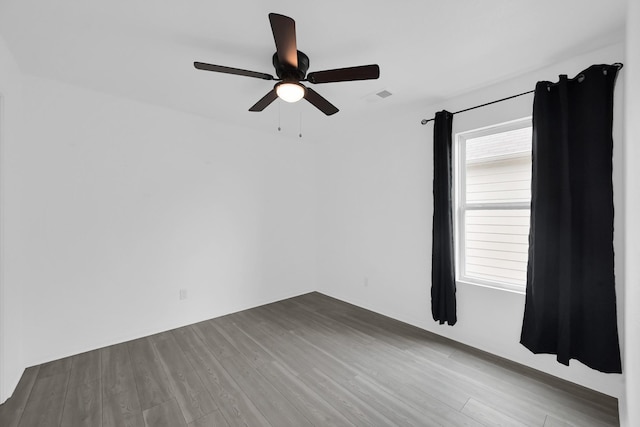 19210 Kent Park Dr, Tomball, TX 77375 - empty room featuring ceiling fan and wood finished floors