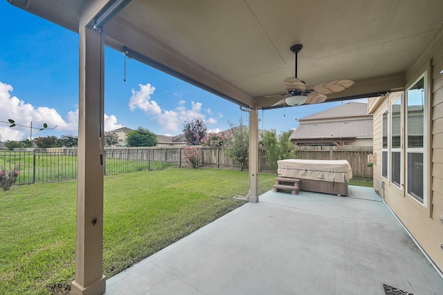 19210 Kent Park Dr, Tomball, TX 77375 - fenced backyard with a patio, ceiling fan, and area for grilling