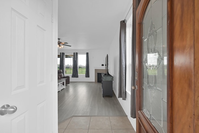 19210 Kent Park Dr, Tomball, TX 77375 - hallway with light tile patterned floors