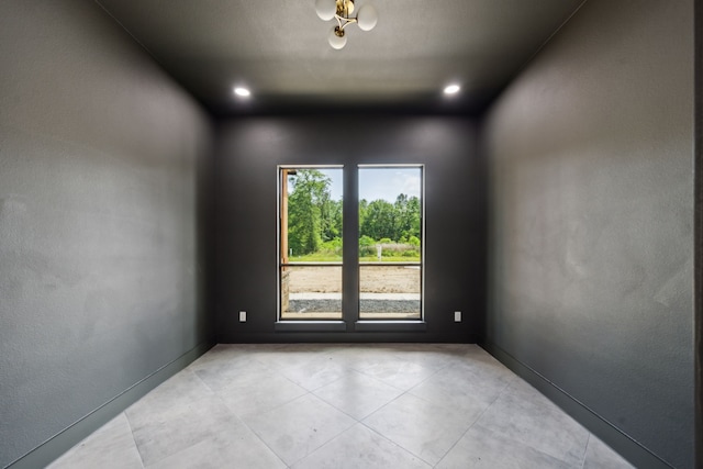 1253 Rd 66112, Dayton, TX 77535 - spare room featuring light tile patterned flooring