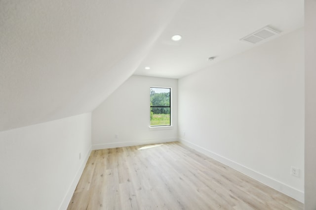 1253 Rd 66112, Dayton, TX 77535 - additional living space featuring recessed lighting, light wood-type flooring, and lofted ceiling