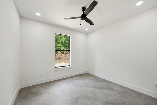 1253 Rd 66112, Dayton, TX 77535 - unfurnished room with a ceiling fan, finished concrete flooring, and recessed lighting