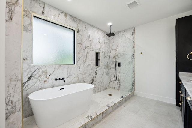 1253 Rd 66112, Dayton, TX 77535 - full bathroom featuring a marble finish shower, a freestanding tub, and vanity