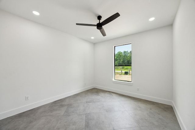 1253 Rd 66112, Dayton, TX 77535 - empty room featuring ceiling fan, recessed lighting, and concrete flooring
