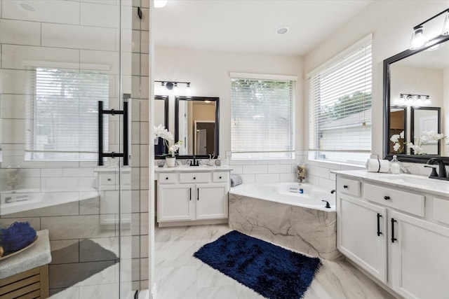 13411 Via Chianti Ln, Cypress, TX 77429 - full bath featuring a garden tub, two vanities, a stall shower, and marble finish flooring