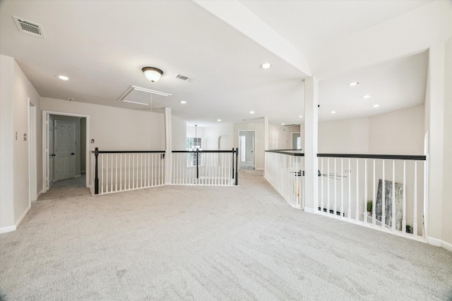 13411 Via Chianti Ln, Cypress, TX 77429 - spare room featuring attic access, light colored carpet, and recessed lighting