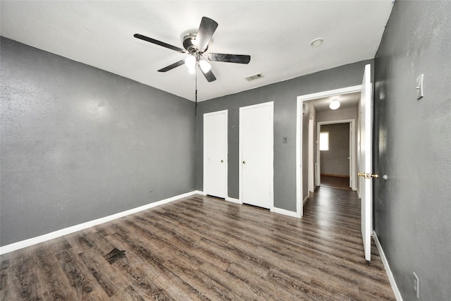 14803 Sunwick St, Houston, TX 77060 - unfurnished bedroom featuring dark wood-style flooring and a ceiling fan