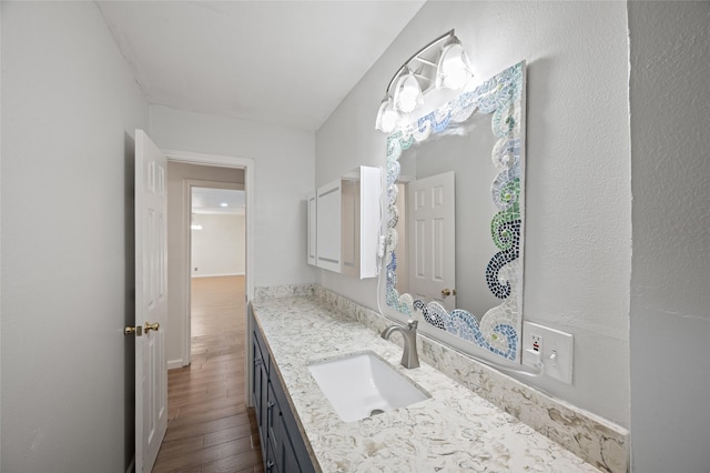 3835 Tartan Ln, Houston, TX 77025 - bathroom featuring hardwood / wood-style floors and vanity