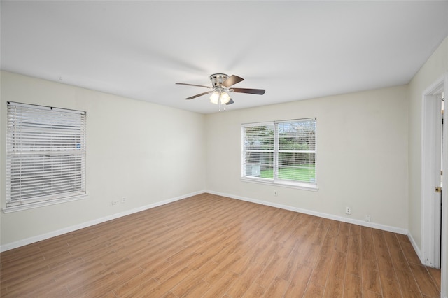 3835 Tartan Ln, Houston, TX 77025 - empty room with a ceiling fan and light wood-style flooring
