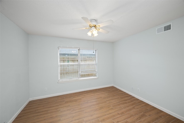 3835 Tartan Ln, Houston, TX 77025 - empty room with wood finished floors and ceiling fan