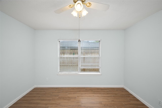 3835 Tartan Ln, Houston, TX 77025 - empty room featuring wood finished floors and a ceiling fan