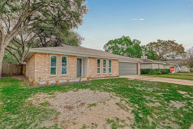 2330 Grindstone Ln, Sugar Land, TX 77498 - single story home featuring a garage, driveway, and brick siding