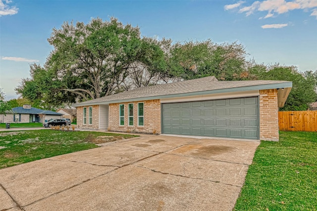 2330 Grindstone Ln, Sugar Land, TX 77498 - view of front facade featuring brick siding, driveway, and a garage