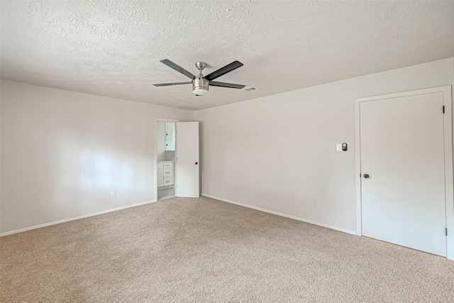 2330 Grindstone Ln, Sugar Land, TX 77498 - unfurnished room featuring carpet, ceiling fan, and a textured ceiling