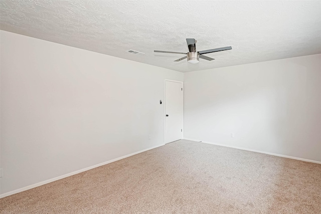 2330 Grindstone Ln, Sugar Land, TX 77498 - unfurnished room featuring a ceiling fan, carpet flooring, and a textured ceiling