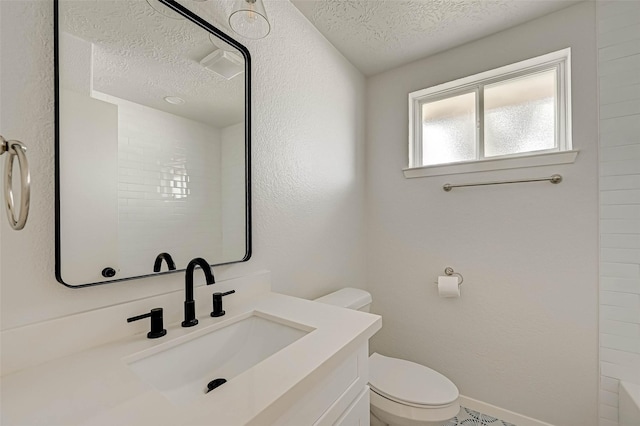 2330 Grindstone Ln, Sugar Land, TX 77498 - bathroom with a textured ceiling and vanity
