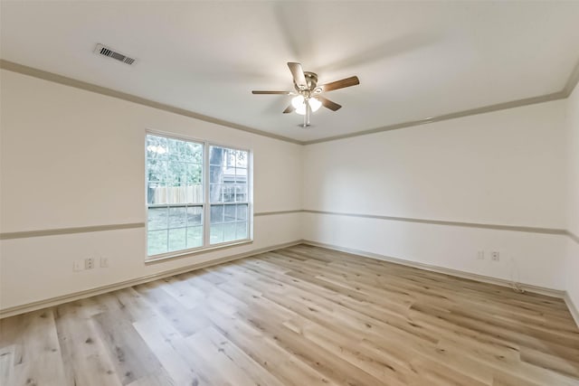 4214 Brightwood Dr, Houston, TX 77068 - spare room featuring light wood-style flooring, a ceiling fan, and ornamental molding