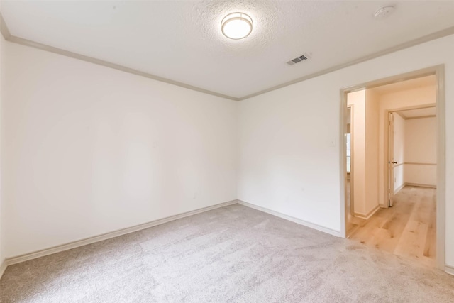 4214 Brightwood Dr, Houston, TX 77068 - unfurnished room with light colored carpet, a smoke detector, and a textured ceiling