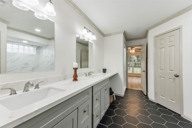 4214 Brightwood Dr, Houston, TX 77068 - bathroom featuring crown molding, healthy amount of natural light, double vanity, tile patterned floors, and recessed lighting