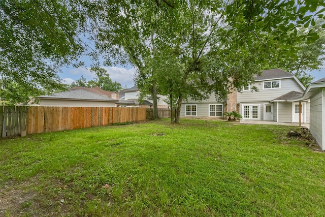 4214 Brightwood Dr, Houston, TX 77068 - fenced backyard with a patio area and french doors