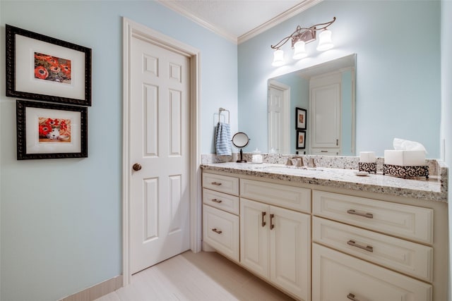 510 Commodore Way, Houston, TX 77079 - bathroom with vanity, ornamental molding, and tile patterned flooring