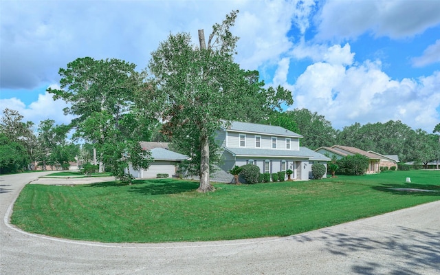 725 River Plantation Dr, Conroe, TX 77302 - view of front of house with a front yard and driveway