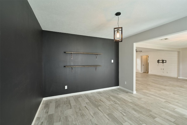 725 River Plantation Dr, Conroe, TX 77302 - empty room featuring light wood-type flooring and baseboards