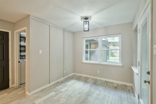 725 River Plantation Dr, Conroe, TX 77302 - empty room featuring light wood-style floors and baseboards