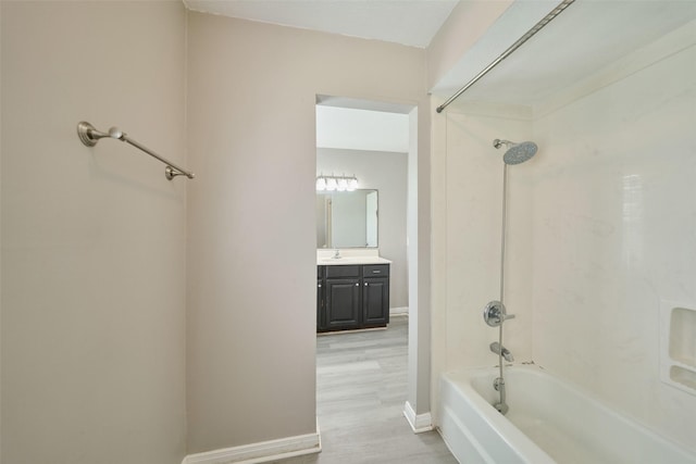 725 River Plantation Dr, Conroe, TX 77302 - full bathroom with  shower combination, vanity, and wood finished floors