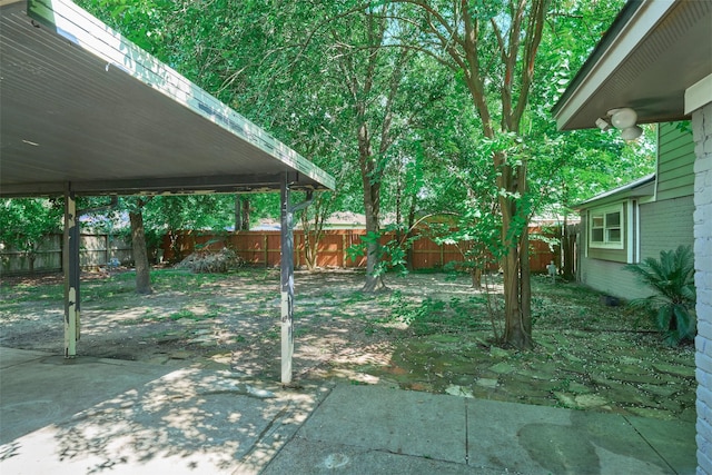 725 River Plantation Dr, Conroe, TX 77302 - fenced backyard with a patio