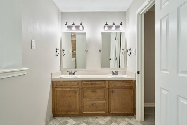 725 River Plantation Dr, Conroe, TX 77302 - full bath with double vanity and baseboards