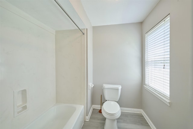725 River Plantation Dr, Conroe, TX 77302 - bathroom featuring plenty of natural light, wood finished floors, and shower / bath combination