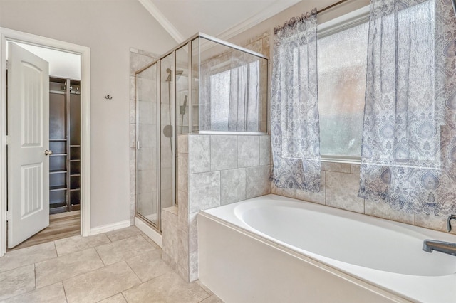3515 Cactus Field Ln, Katy, TX 77449 - full bathroom featuring a bath, a stall shower, ornamental molding, and tile patterned floors