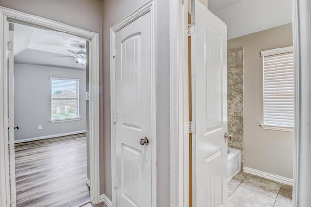 3515 Cactus Field Ln, Katy, TX 77449 - corridor featuring baseboards and light tile patterned floors