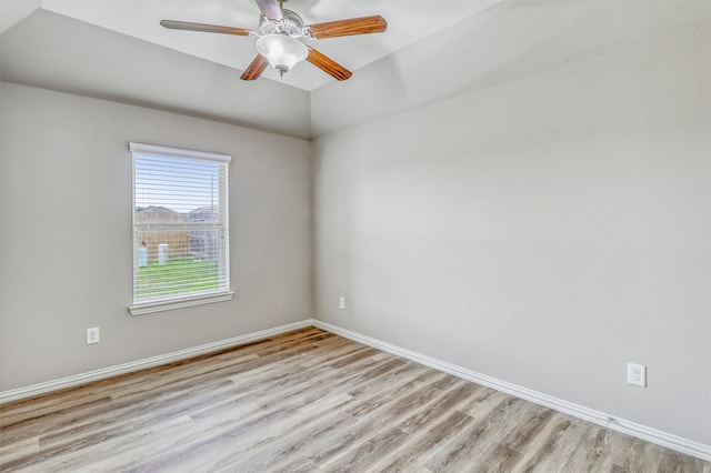 3515 Cactus Field Ln, Katy, TX 77449 - unfurnished room featuring light wood finished floors, vaulted ceiling, and ceiling fan