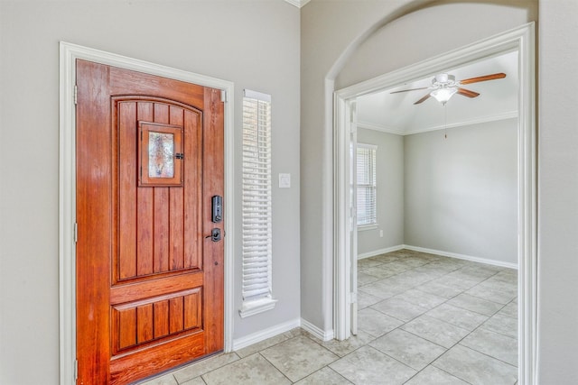 3515 Cactus Field Ln, Katy, TX 77449 - entrance foyer with ornamental molding, ceiling fan, and light tile patterned floors