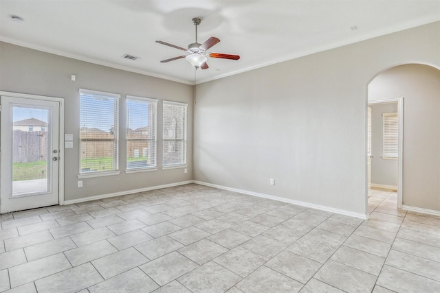 3515 Cactus Field Ln, Katy, TX 77449 - unfurnished room with light tile patterned floors, arched walkways, ceiling fan, a smoke detector, and crown molding