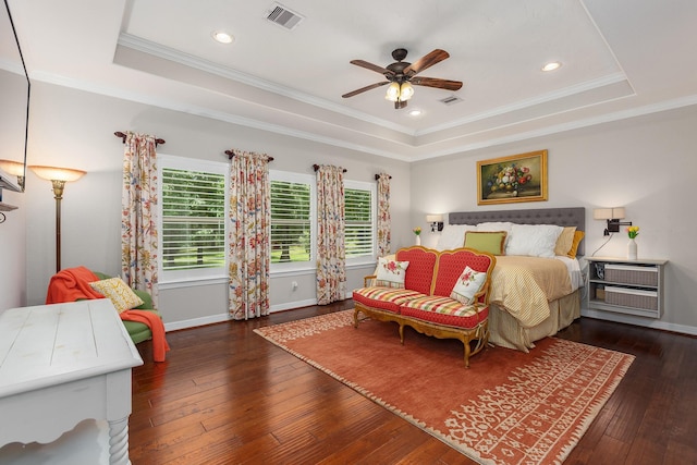 27724 Colapis Dr, Splendora, TX 77372 - bedroom featuring a tray ceiling, heating unit, ornamental molding, hardwood / wood-style floors, and recessed lighting