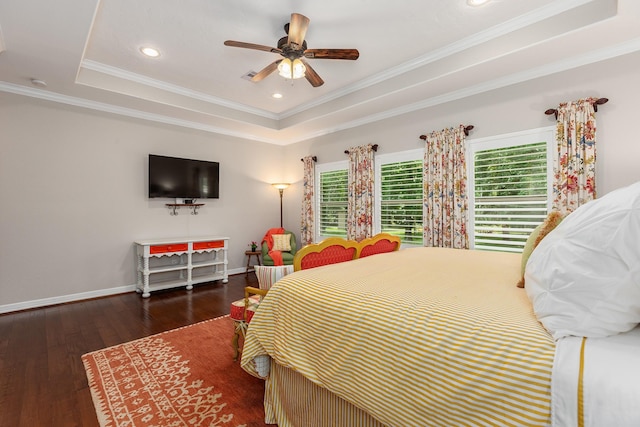 27724 Colapis Dr, Splendora, TX 77372 - bedroom featuring multiple windows, a tray ceiling, ornamental molding, wood finished floors, and recessed lighting