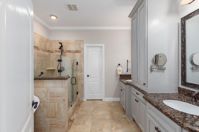 27724 Colapis Dr, Splendora, TX 77372 - bathroom with a shower stall, vanity, and crown molding