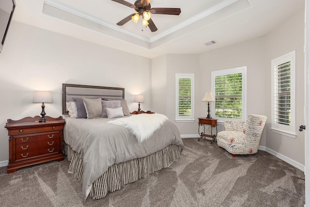 27724 Colapis Dr, Splendora, TX 77372 - bedroom with a tray ceiling, carpet flooring, ornamental molding, and ceiling fan