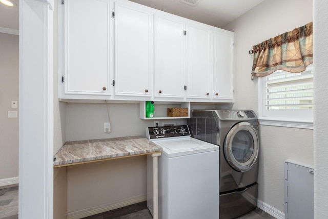 27724 Colapis Dr, Splendora, TX 77372 - washroom with cabinet space and washer and clothes dryer